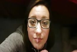 Girl with glasses drowning in cum after facial